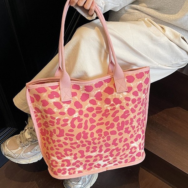 High-end texture leopard print canvas single-shoulder bag for women, Spring 2025, large-capacity tote bag, niche commuting underarm bag full figure