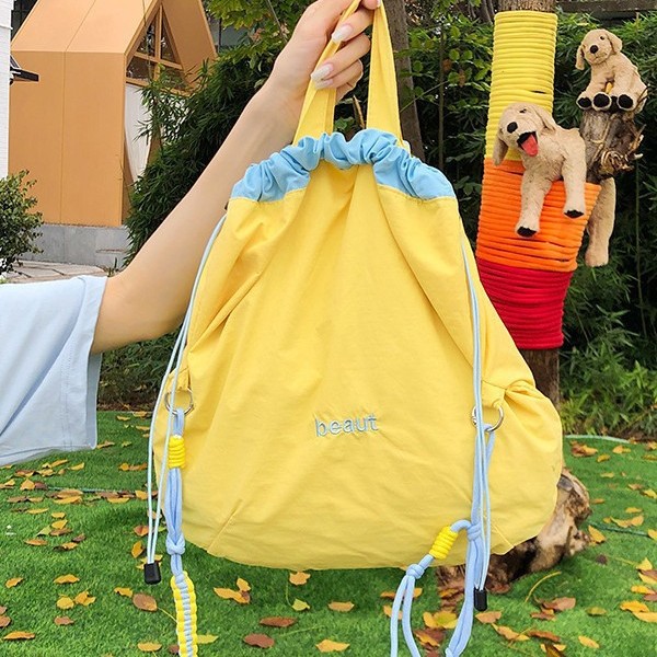 Korean niche drawstring drawstring single-shoulder bag, trendy women's quick-drying lightweight crossbody bag, ice cream-colored soft tote bag details Picture
