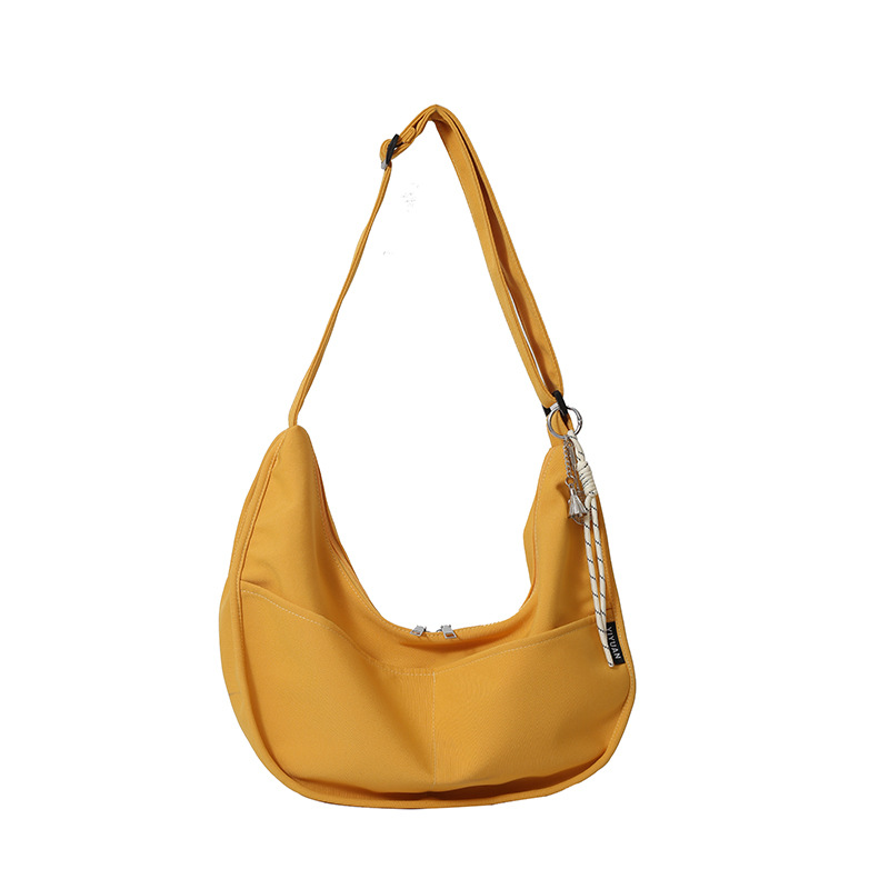 Crossbody bag, Japanese-style men's and women's large-capacity artistic dumpling bag, ins solid color retro personality nylon canvas bag Item Picture