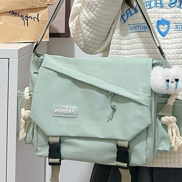 The trend of Japanese-style Harajuku retro workwear crossbody bags, large-capacity postman bags for Korean students, and single-shoulder bags for men details Picture