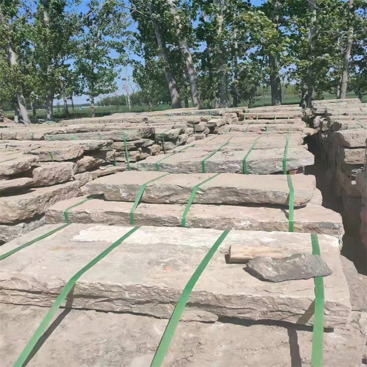 The road is paved with old bluestone slabs. The old park and courtyard are decorated with antique stone slabs. The stepping stones are made of bluestone and the old stone slabs are used details Picture