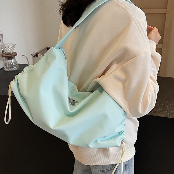Autumn and winter high-capacity commuter Tote bag for women, 2024 new solid color fashionable drawstring single-shoulder bag, fabric bag details Picture