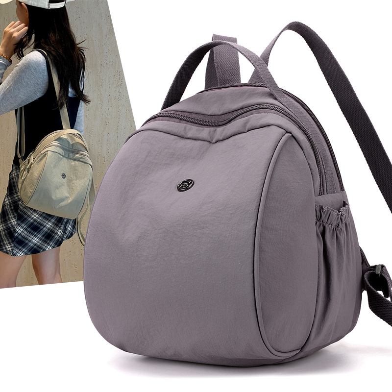 Wholesale women's backpacks 2024 Autumn new style casual travel backpacks, lightweight and simple nylon hand-held small schoolbags full figure