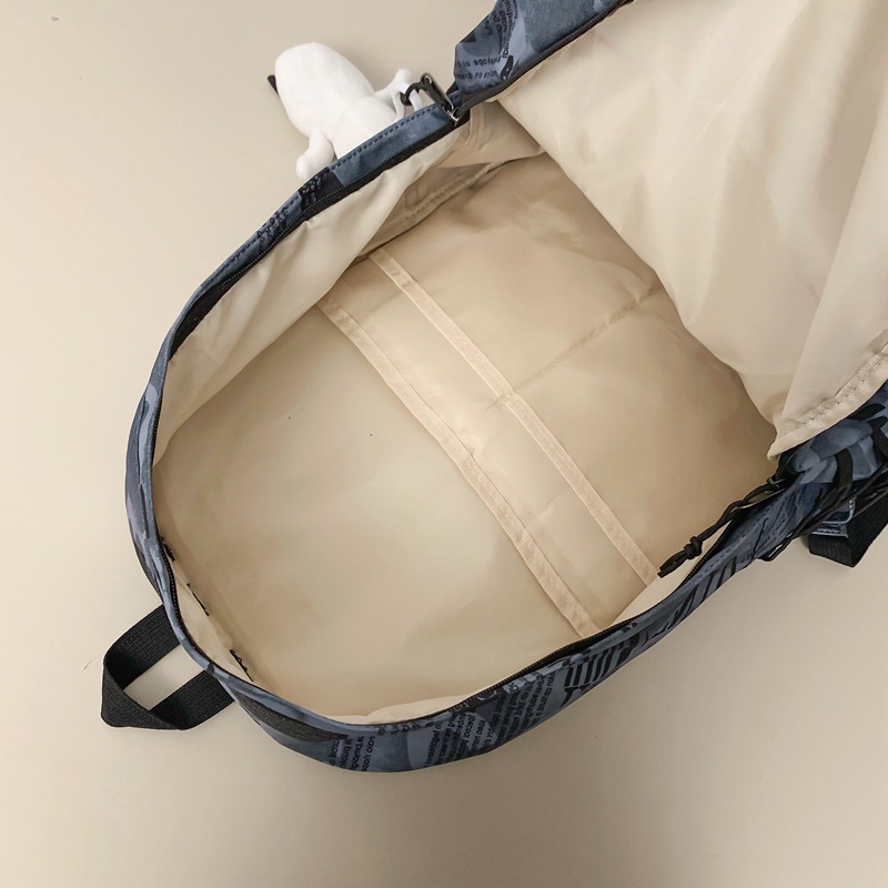 A new 2024 personalized graffiti backpack for middle school students, a Japanese trendy brand travel backpack for college students and couples Application Scenario