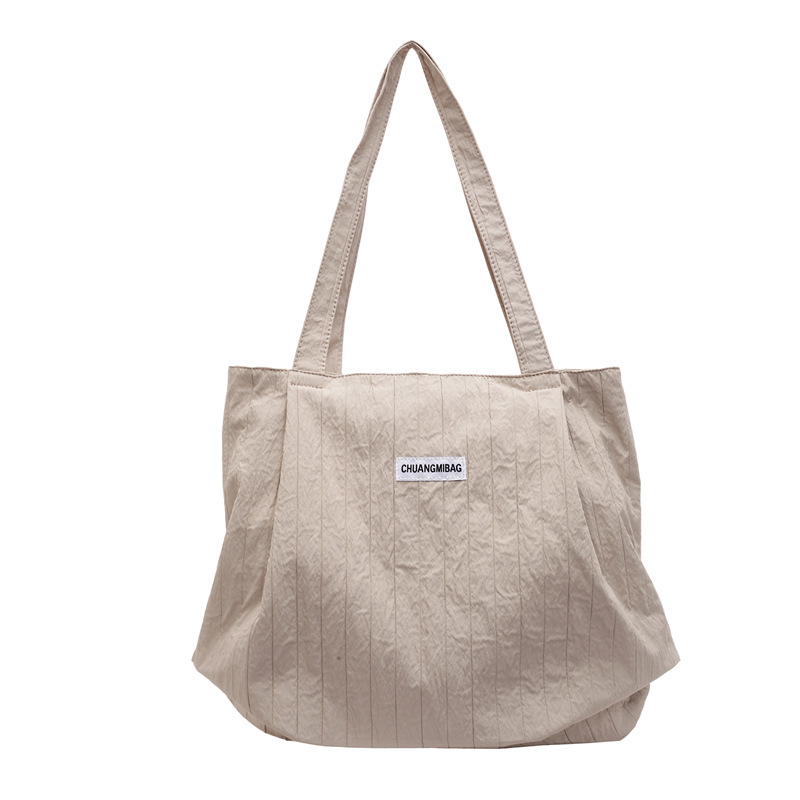 A new 2024 Korean-style large-capacity cloth bag for women, a versatile and fashionable lightweight shoulder bag, and a casual and versatile underarm bag Item Picture