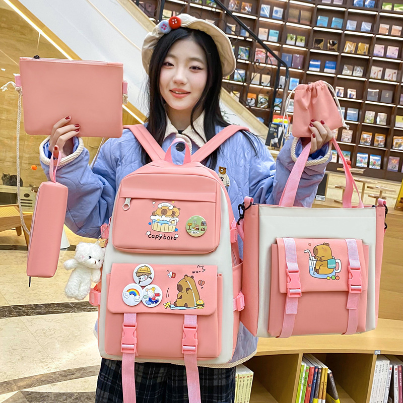 New Capibara canvas backpack for girls, cute and versatile, large-capacity five-piece set for primary and secondary school students Application Scenario