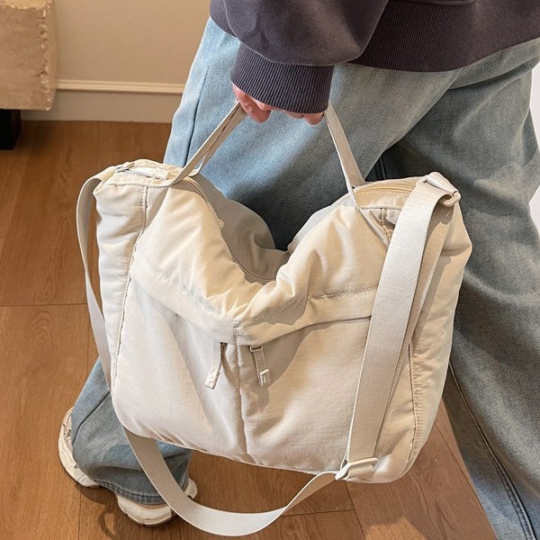 Waterproof nylon fabric dumpling bag for both men and women, simple and sporty style, large-capacity casual single-shoulder tote bag details Picture
