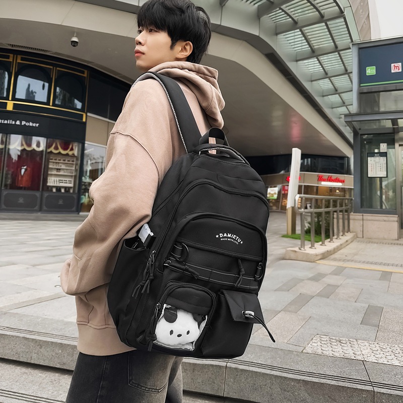 A new 2024 personalized large-capacity backpack for middle school students, a Japanese trendy brand travel backpack for college students and couples details Picture