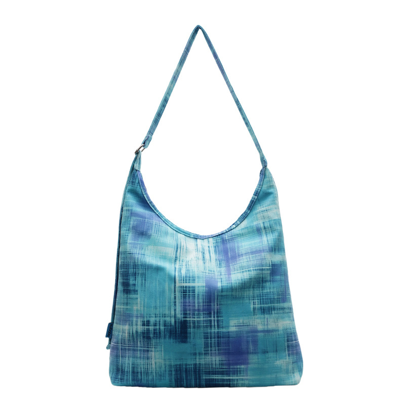 A new large-capacity, fresh crossbody bag with a Korean style, featuring a niche design, multi-color printed handbags, versatile underarm bags Item Picture
