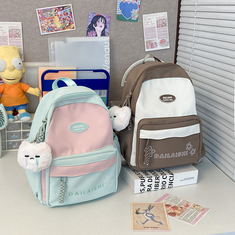 A new cross-border, fresh, sweet and casual children's backpack with a color-blocking design and large-capacity student backpack full figure