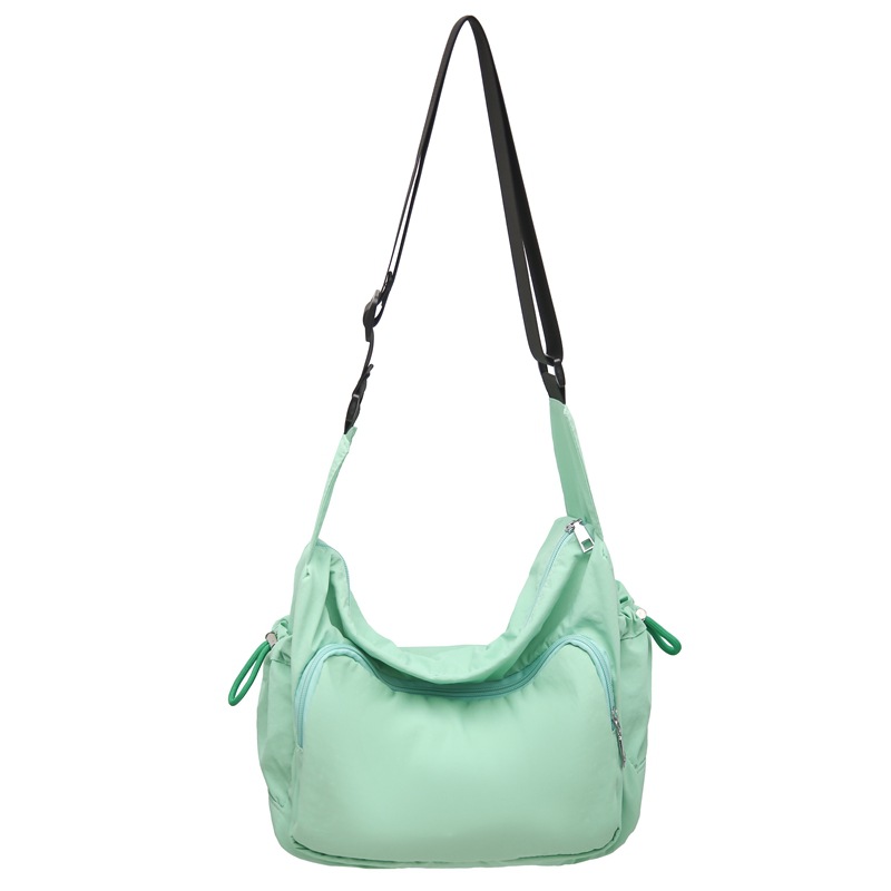 A lightweight, simple and casual women's 2024 new commuter fabric bag, solid color, multi-pocket, large capacity, single-shoulder crossbody bag for women Item Picture