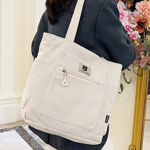 New autumn and winter 2024 large-capacity storage bag, school-style hand-held student tutorial bag, casual commuting single-shoulder bag details Picture