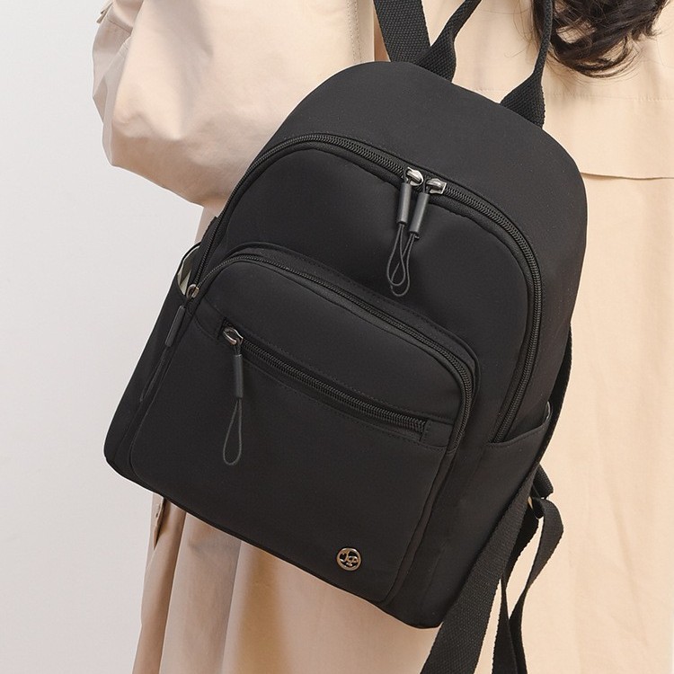 Fashionable and casual small backpack travel bag, trendy and versatile, water-resistant nylon fabric bag, simple and elegant backpack for women to go out details Picture