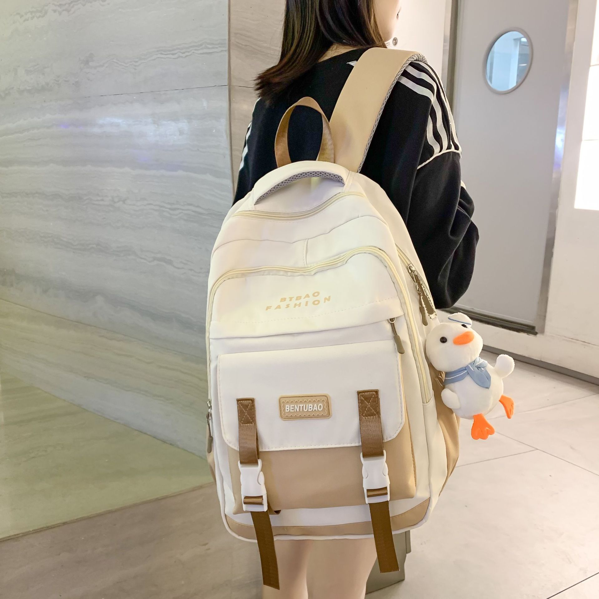 The new schoolbag for girls is in the Korean style of Instagram. It is a backpack for junior and senior high school students with multiple layers. It is also a backpack for primary school students for boys details Picture