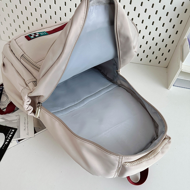 American-style versatile high-capacity schoolbag for junior high school students, color-blocking backpack for girls and middle school students, and Instagram casual computer backpack Application Scenario