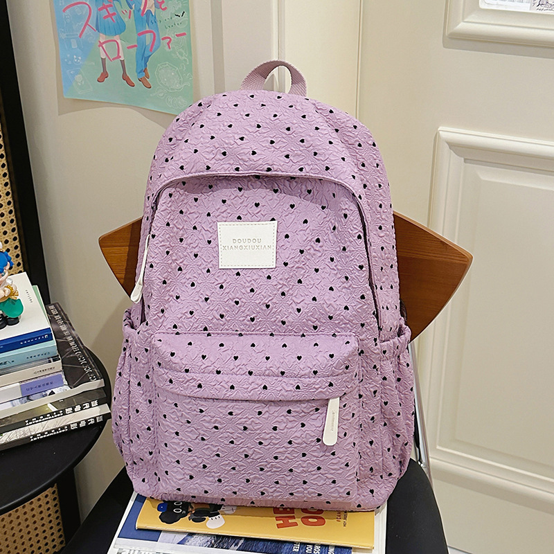 The fresh and cute schoolbag is a niche and adorable girl with floral prints. It has a large capacity and is versatile for high school and junior high school students. The college student backpack has a high level of appearance Specification drawing