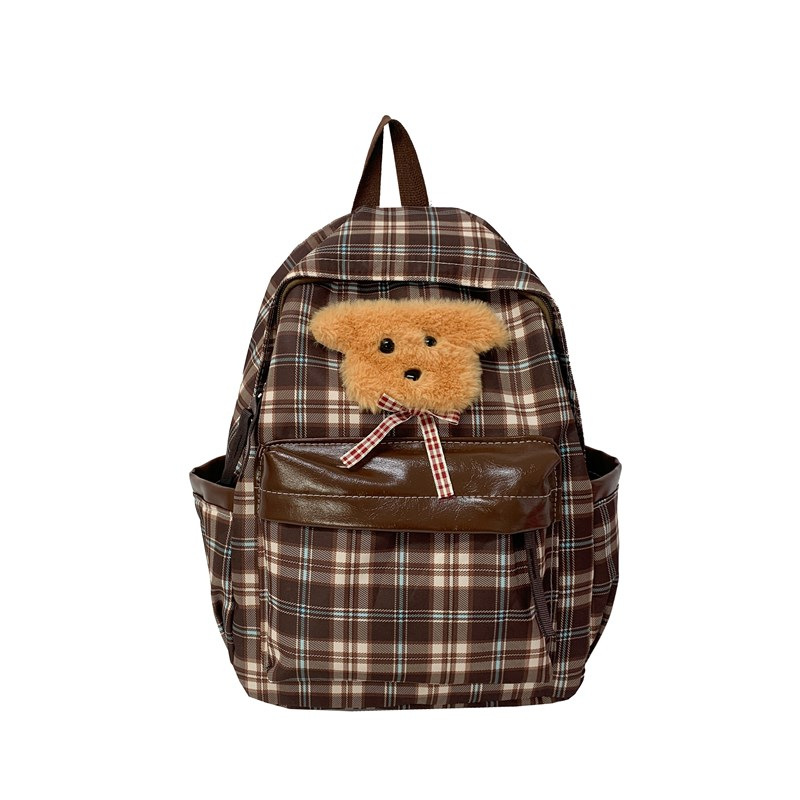 The 2025 new Japanese-style in cute dog checkered patchwork backpack is a fashionable and large-capacity versatile backpack for commuting Application Scenario