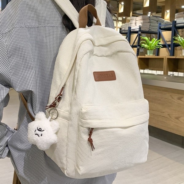 Corduroy lightweight and wear-resistant university backpack, fashionable and simple, large-capacity student schoolbag, solid color cute backpack details Picture