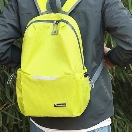 A new fashionable, lightweight and foldable couple backpack with a large capacity of nylon fabric for portable travel full figure