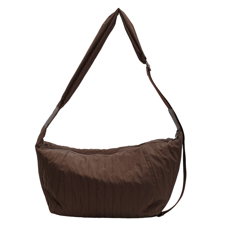 A new large-capacity casual hand-held shoulder bag with a Korean-style relaxed feel for women, featuring a fashionable and simple pleated dumpling bag Item Picture