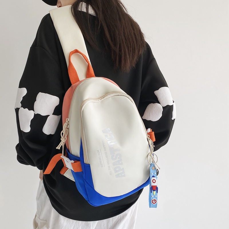 Japanese color-blocking crossbody bag for female students, sports chest bag for women, large-capacity casual trendy brand canvas single-shoulder backpack for men full figure