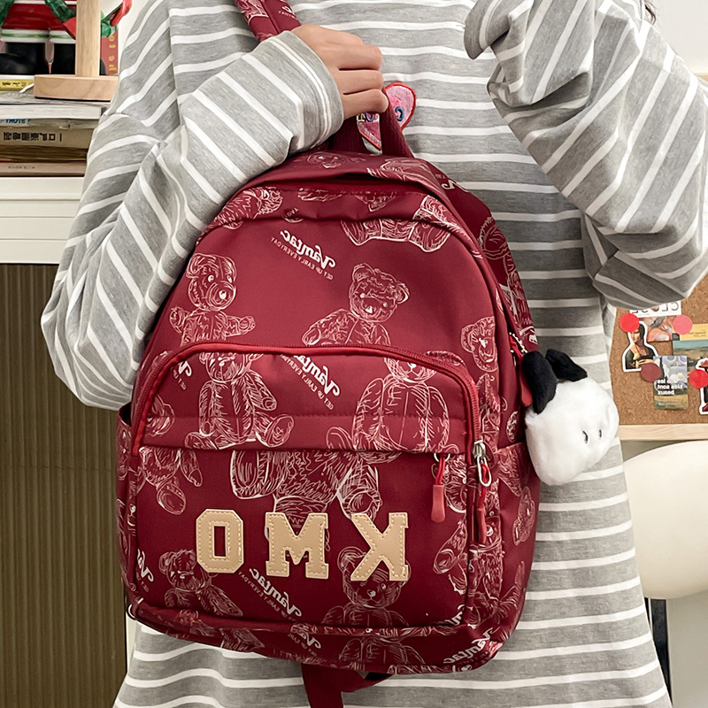 Cross-border schoolbag, niche design, primary school student printed backpack, simple bear backpack, lightweight travel backpack for going out details Picture