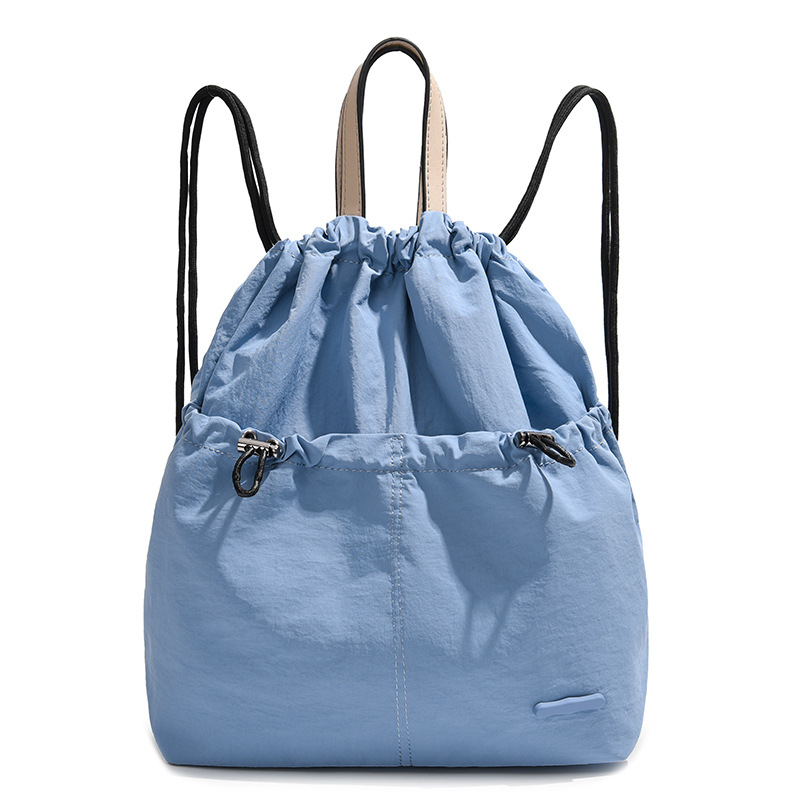 Japanese and Korean ins drawstring backpacks, simple solid color, lightweight and large-capacity commuting backpacks, outdoor sports bags Item Picture
