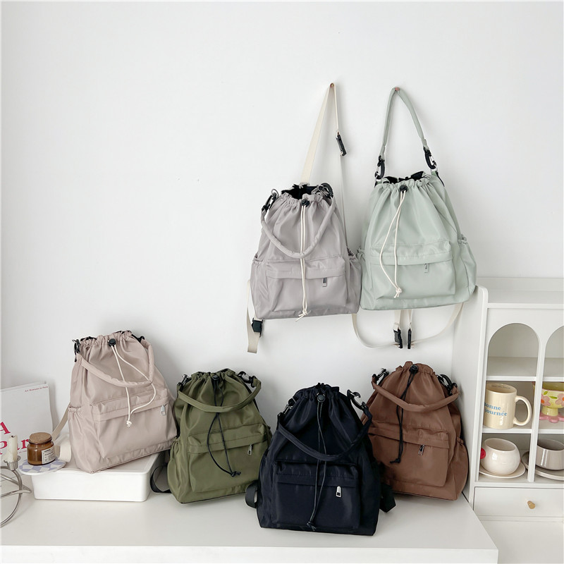 Single-shoulder crossbody bag 2025, fashionable and casual bucket bag, new Korean version, double-shoulder women's bag, large capacity hand-held drawstring bag Application Scenario