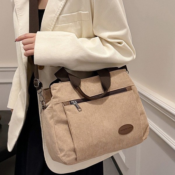 Retro and simple large-capacity corduroy fabric bag, women's hand-held shoulder crossbody bag, multi-compartment commuting bag, multi-functional bag details Picture