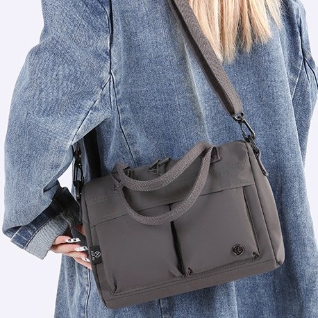 A new Japanese and Korean canvas Instagram commuter women's single-shoulder briefcase, a fresh and artistic solid-color hand-held crossbody bag for women details Picture