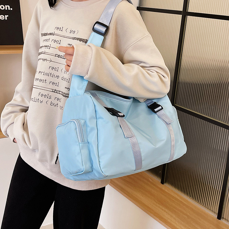 Wholesale short-distance travel bags for foreign trade, large-capacity travel bags for men and women on business trips, simple and convenient side-pocket sports and fitness bags Specification drawing