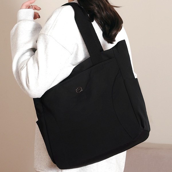 Large-capacity single-shoulder bag, simple and lightweight tote bag, tutorial bag, casual wash bag, nylon fabric bag, women's hand-held document bag details Picture
