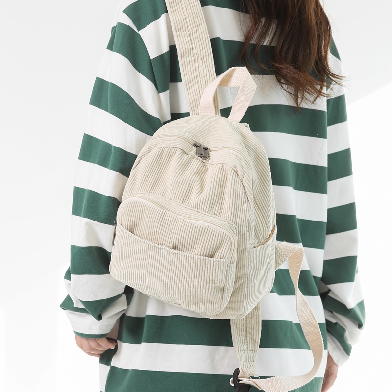 Corduroy solid-color schoolbag for girls, Tang Donation backpack, Korean version, high school and college students, retro and simple mini backpack for girls full figure
