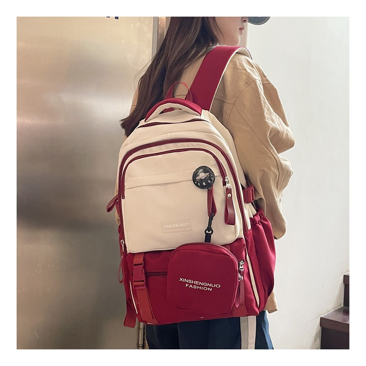New Korean-style backpacks for high school, junior high school and college students, large-capacity schoolbags, women's casual commuting backpacks full figure