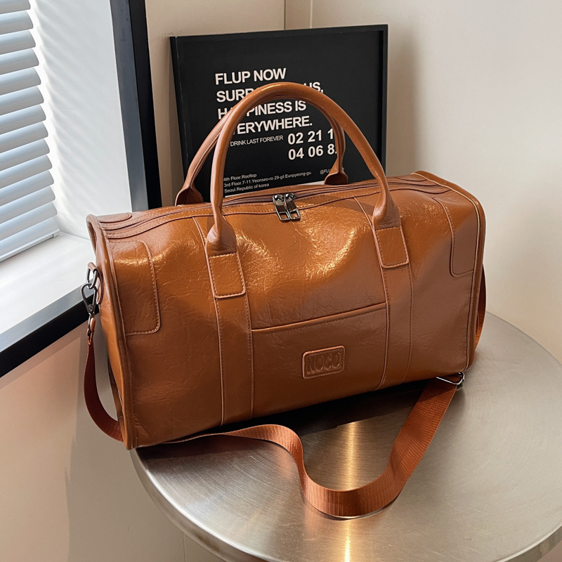 New cross-border business travel bags, large-capacity student accommodation luggage bags, men's and women's soft leather-like sports and fitness bags full figure