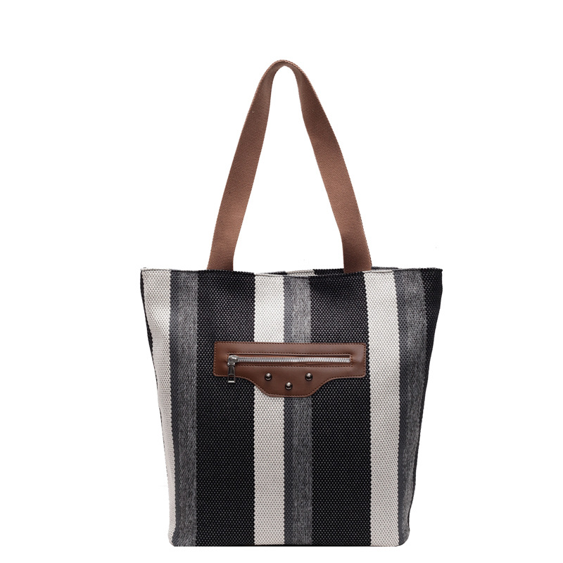 A niche striped canvas bag for women, 2024 new large-capacity commuter tote bag, versatile student single-shoulder tote bag Item Picture