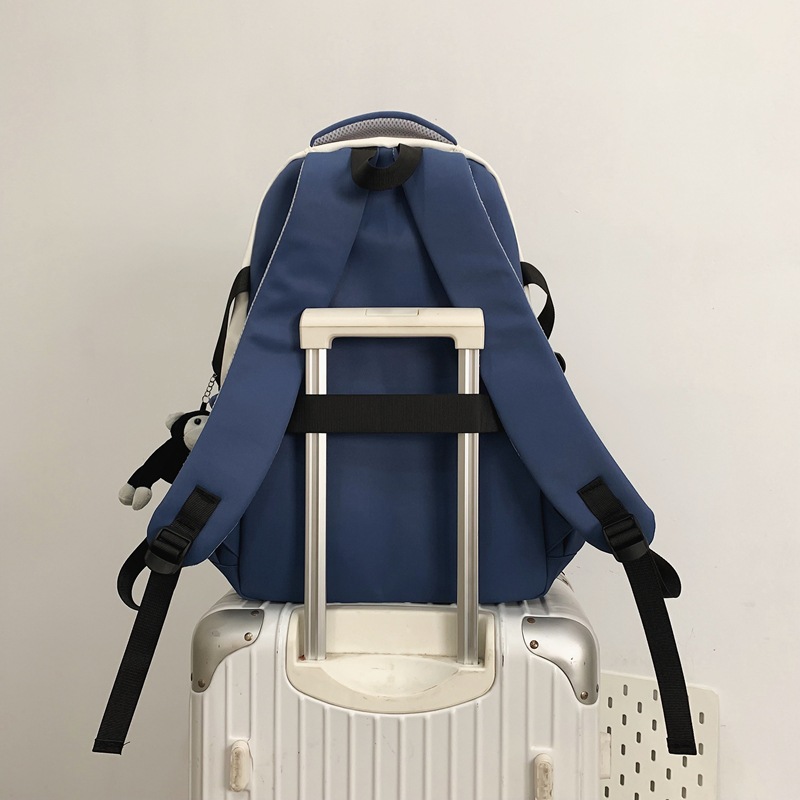 Personalized cartoon schoolbags for girls, trendy brand backpacks for junior and senior high school students, color-blocking large-capacity travel backpacks for college students Application Scenario