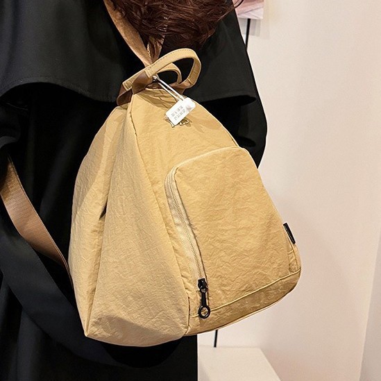 Lightweight bag for women, Spring 2025 collection: Fashionable hand-held backpack, dual-purpose single-shoulder fashionable washable fabric crossbody bag Application Scenario