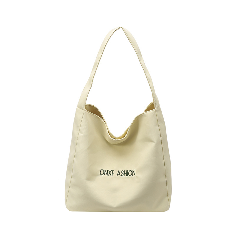The 2025 new shiny nylon tote bag is a niche, large-capacity, simple and casual daily backpack with a fresh and clean look Item Picture