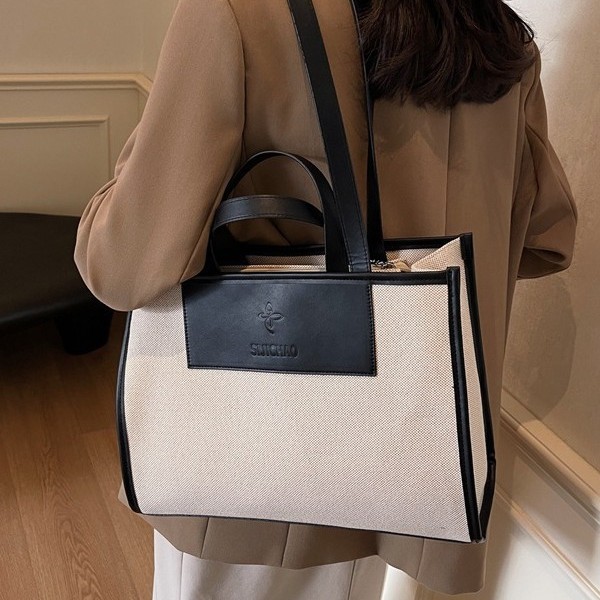 A new high-capacity, high-quality tote bag for women's casual work and commuting, a simple hand-held shoulder bag for autumn and winter details Picture