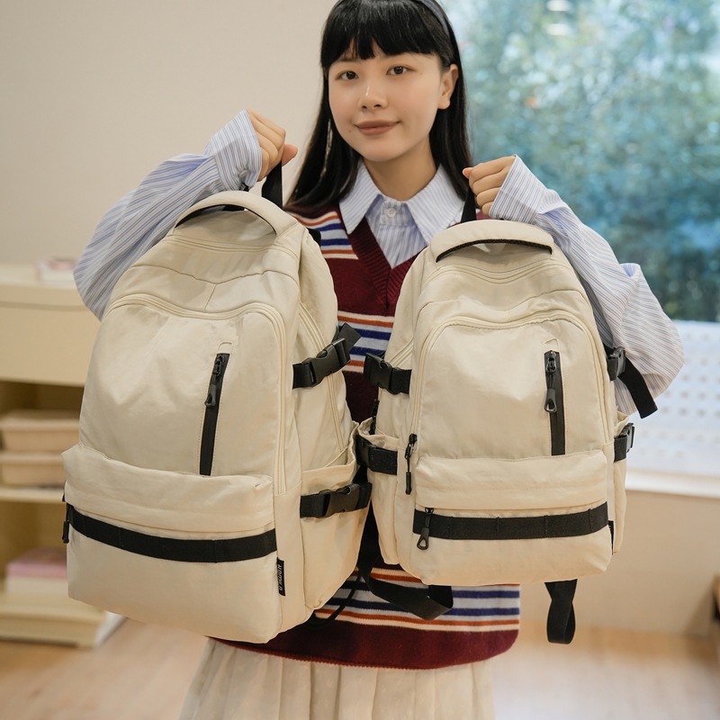 Unisply-style backpacks, large capacity and simple design for college students, casual schoolbags for junior high school students, versatile backpacks for outings and travels full figure