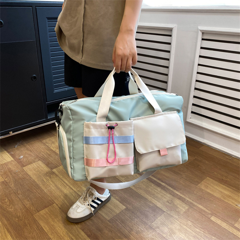 Travel bag for women, large-capacity portable, lightweight and waterproof luggage bag, short-distance business trip, travel, boarding, maternity bag, storage bag Specification drawing
