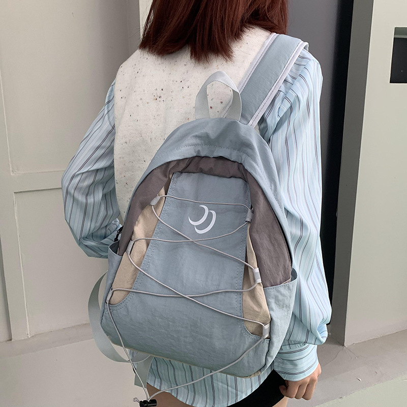 Cross-border solid-color backpacks, outdoor travel backpacks, sports small bags, new lightweight and large-capacity schoolbags details Picture