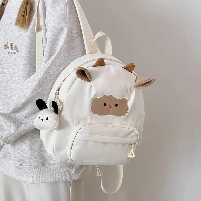 Cute and ugly cartoon little sheep children's spring outing mini backpack, high appearance level, creamy style soft girl shopping small backpack details Picture