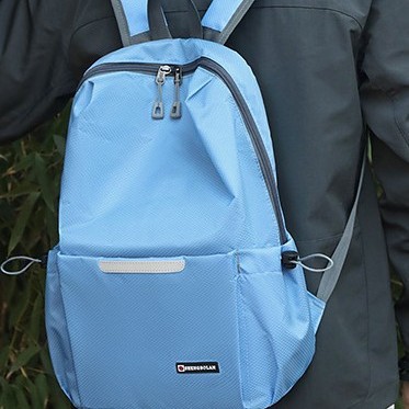 A new fashionable, lightweight and foldable couple backpack with a large capacity of nylon fabric for portable travel details Picture