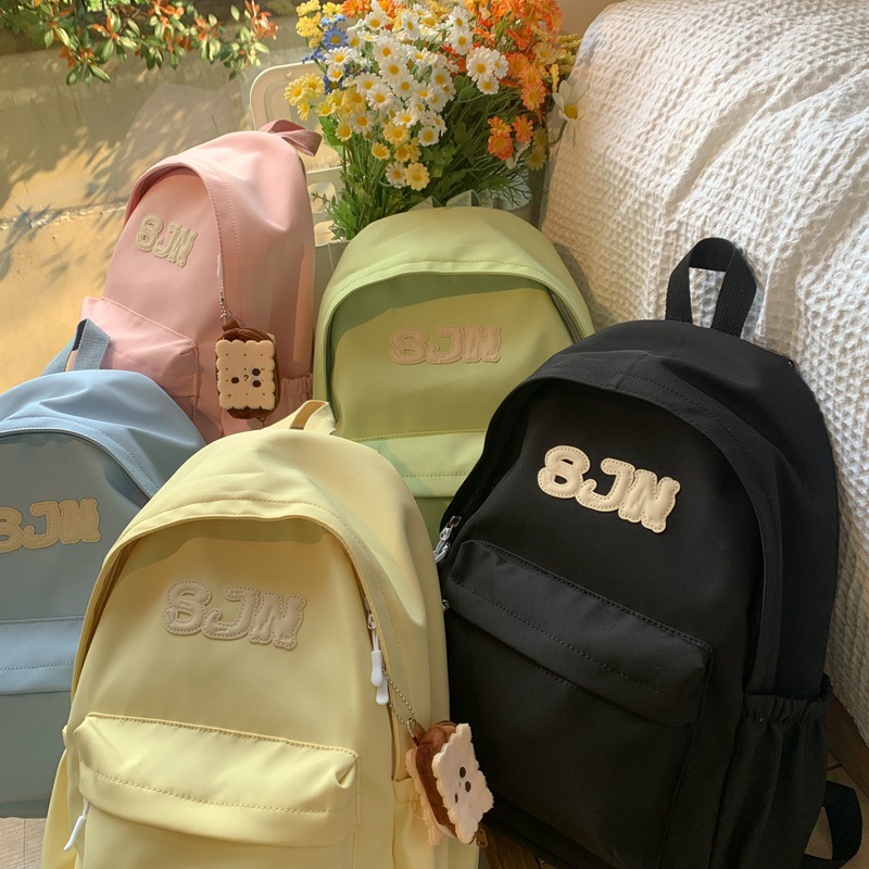 Simple and high-appearation-level schoolbag, solid-color, niche and simple campus-style backpack for junior high school and college students, travel and commuting backpack details Picture