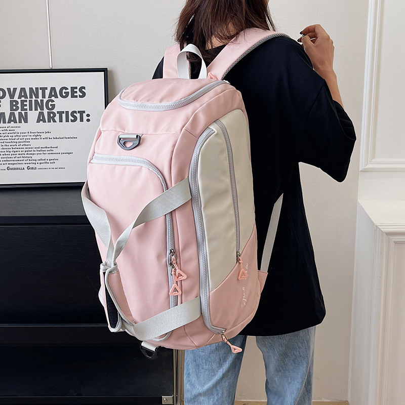 Wholesale of large-capacity travel backpacks, portable clothing bags for going out, small luggage bags for boarding and business trips Application Scenario
