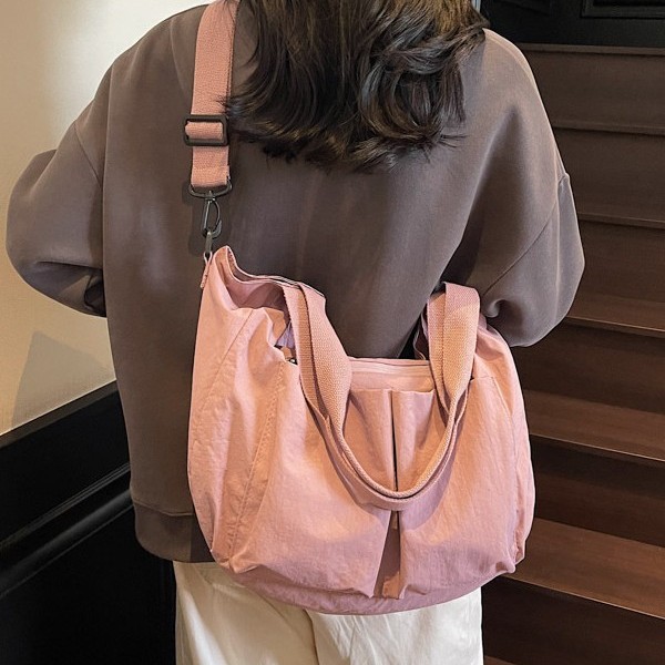 Solid-color single-shoulder bag, simple and casual, large-capacity bag, Oxford cloth backpack, new fashionable and versatile commuting bag, handbag full figure