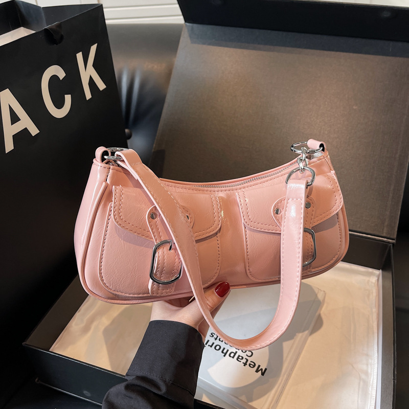 A trendy and versatile underarm bag for women in 2025, featuring a fashionable pleated dumpling bag in a Korean style with a unique and high-end feel full figure