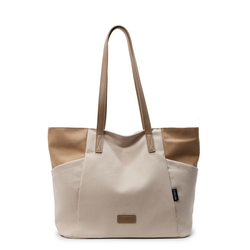 Color-blocking single-shoulder bag for women, large-capacity school commuting tote bag, lightweight and high-end bag, travel and business trip casual handbag Item Picture